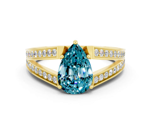 Yellow gold Pear Cut Blue Topaz Split Shank Ring with Pavé Band and Four-Prong Setting