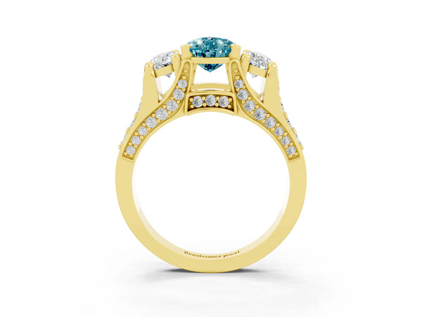Yellow gold Pear Cut Blue Topaz Three-Stone Ring with Channel Set Band and Four-Prong Setting
