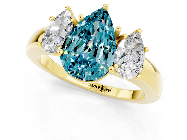 Yellow gold Pear Cut Blue Topaz Three-Stone Ring with Four-Prong Setting and Classic Band