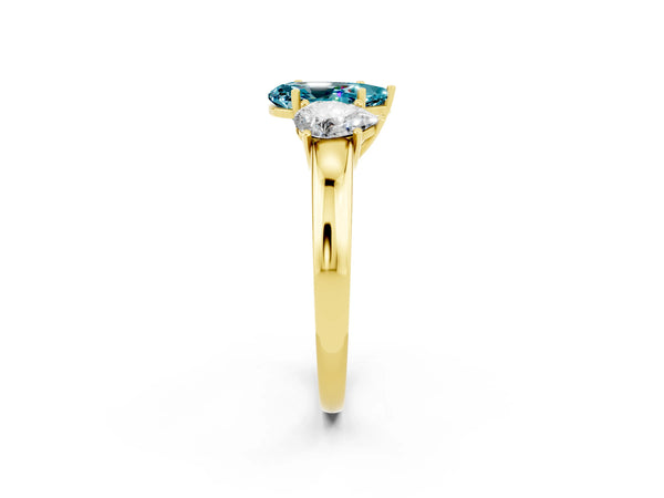 Yellow gold Pear Cut Blue Topaz Three-Stone Ring with Four-Prong Setting and Classic Band