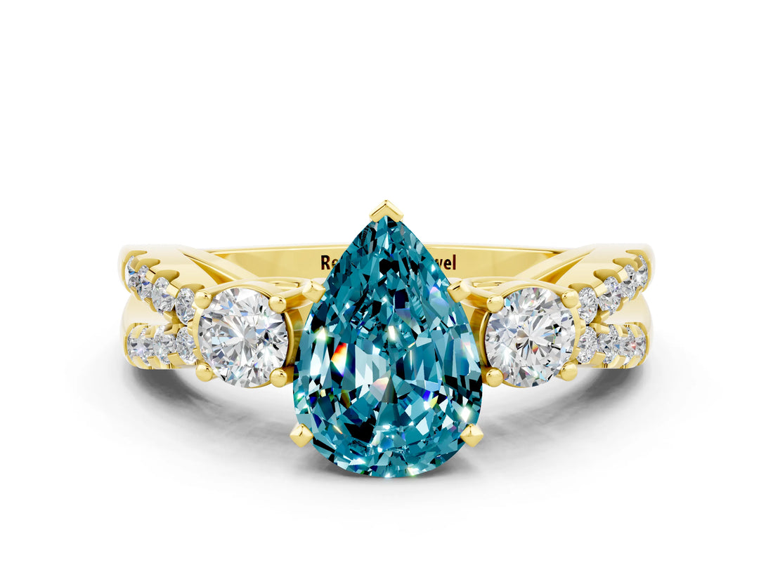 Yellow gold Pear Cut Blue Topaz Three-Stone Ring with Pavé Split Shank and Four-Prong Setting_12