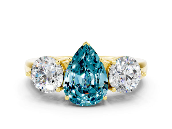 Yellow gold Pear Cut Blue Topaz Three-Stone Ring with Prong Setting and Classic Band