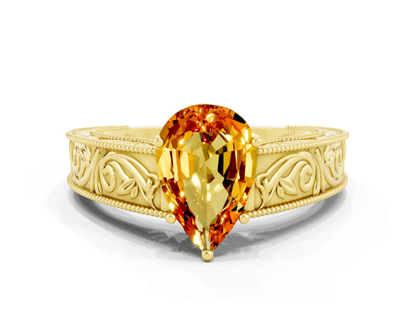 Yellow gold Pear Cut Citrine Solitaire Ring with Engraved Band and Four-Prong Setting