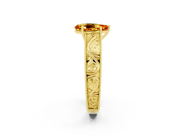 Yellow gold Pear Cut Citrine Solitaire Ring with Engraved Band and Four-Prong Setting