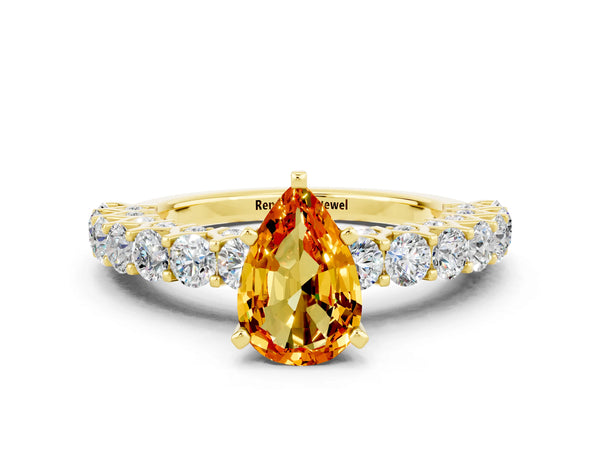 Yellow gold Pear Cut Citrine Solitaire Ring with Shared Prong Pavé Band and Four-Prong Setting