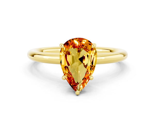 Yellow gold Pear Cut Citrine Solitaire Ring with Thin Band and Four-Prong Setting