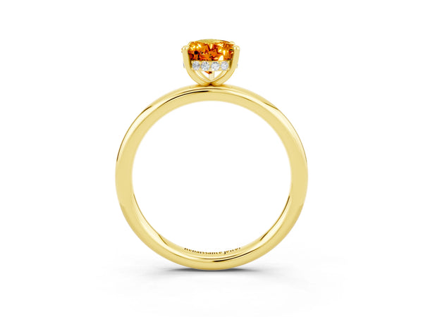 Yellow gold Pear Cut Citrine Solitaire Ring with Thin Band and Four-Prong Setting