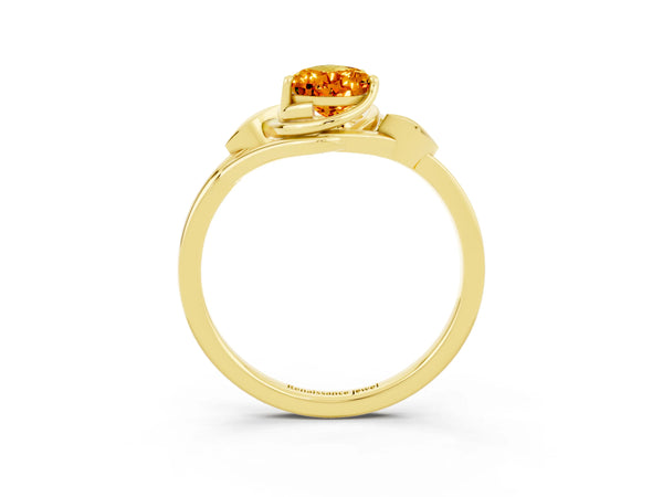 Yellow gold Pear Cut Citrine Solitaire Ring with Twist Band and Four-Prong Setting