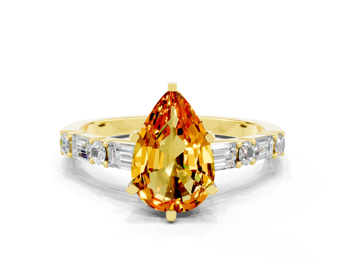Yellow gold Pear Cut Citrine Solitaire with Side Baguettes and Channel Set Band