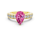 Yellow gold Pear Cut Cut Channel Set Diamond Engagement Ring with Four-Prong Setting