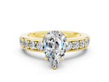 Yellow gold Pear Cut Cut Channel Set Diamond Engagement Ring with Four-Prong Setting