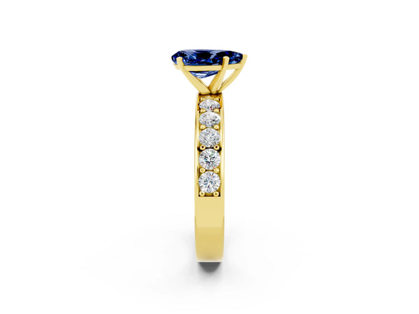 Yellow gold Pear Cut Blue Sapphire Engagement Ring with Channel Set Round  Band and Prong Setting