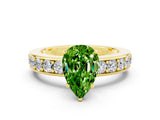 Yellow gold Pear Cut Cut Channel Set Diamond Engagement Ring with Four-Prong Setting