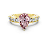 Yellow gold Pear Cut Cut Channel Set Diamond Engagement Ring with Four-Prong Setting