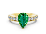 Yellow gold Pear Cut Cut Channel Set Diamond Engagement Ring with Four-Prong Setting