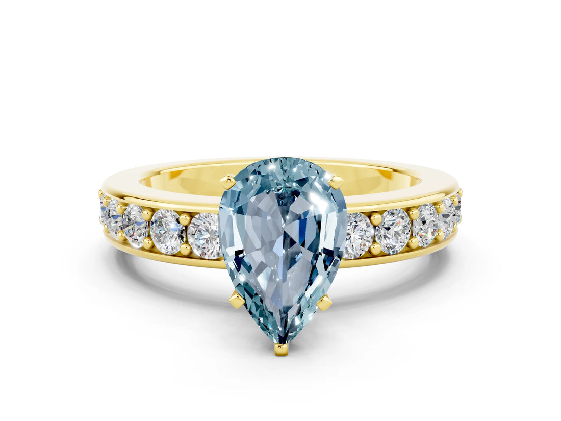 Yellow gold Pear Cut Cut Channel Set Diamond Engagement Ring with Four-Prong Setting