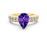 Yellow gold Pear Cut Cut Channel Set Diamond Engagement Ring with Four-Prong Setting