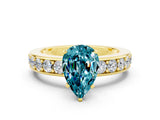 Yellow gold Pear Cut Cut Channel Set Diamond Engagement Ring with Four-Prong Setting