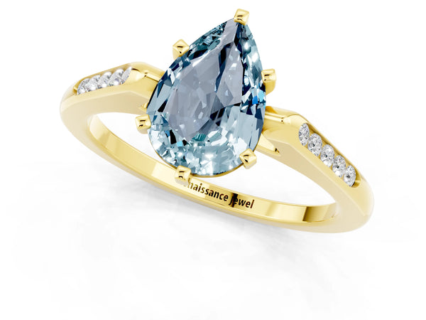 Yellow gold Pear Cut Aquamarine Solitaire Ring with Channel Set Round Band and Prong Setting