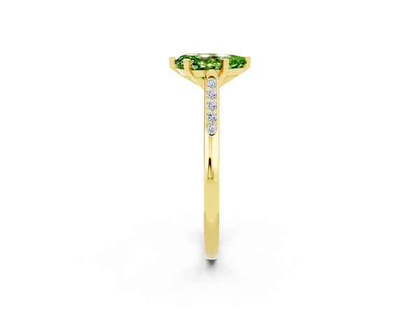 Yellow gold Pear Cut Peridot Solitaire Ring with Channel Set Round Band and Prong Setting