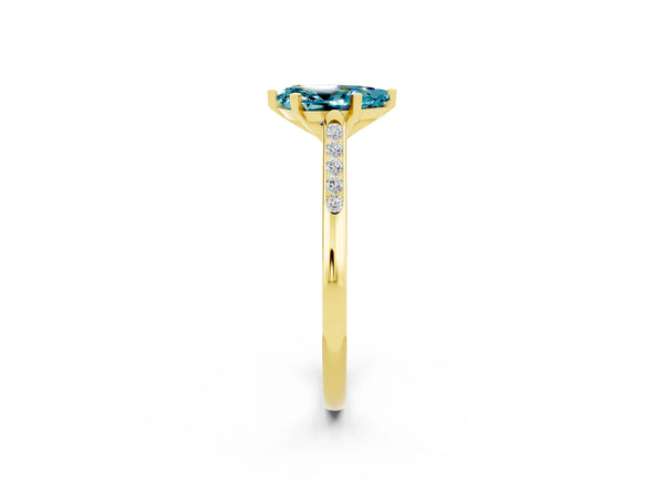 Yellow gold Pear Cut Blue Topaz Solitaire Ring with Channel Set Round Band and Prong Setting