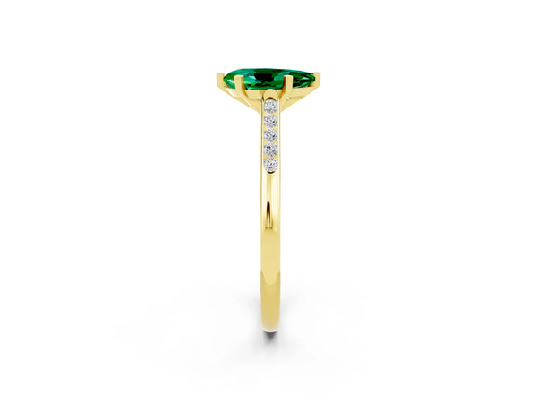 Yellow gold Pear Cut Emerald Solitaire Ring with Channel Set Round Band and Prong Setting