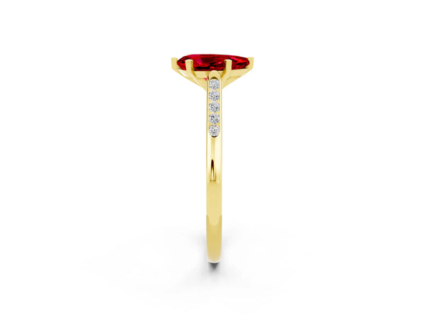 Yellow gold Pear Cut Ruby Solitaire Ring with Channel Set Round Band and Prong Setting