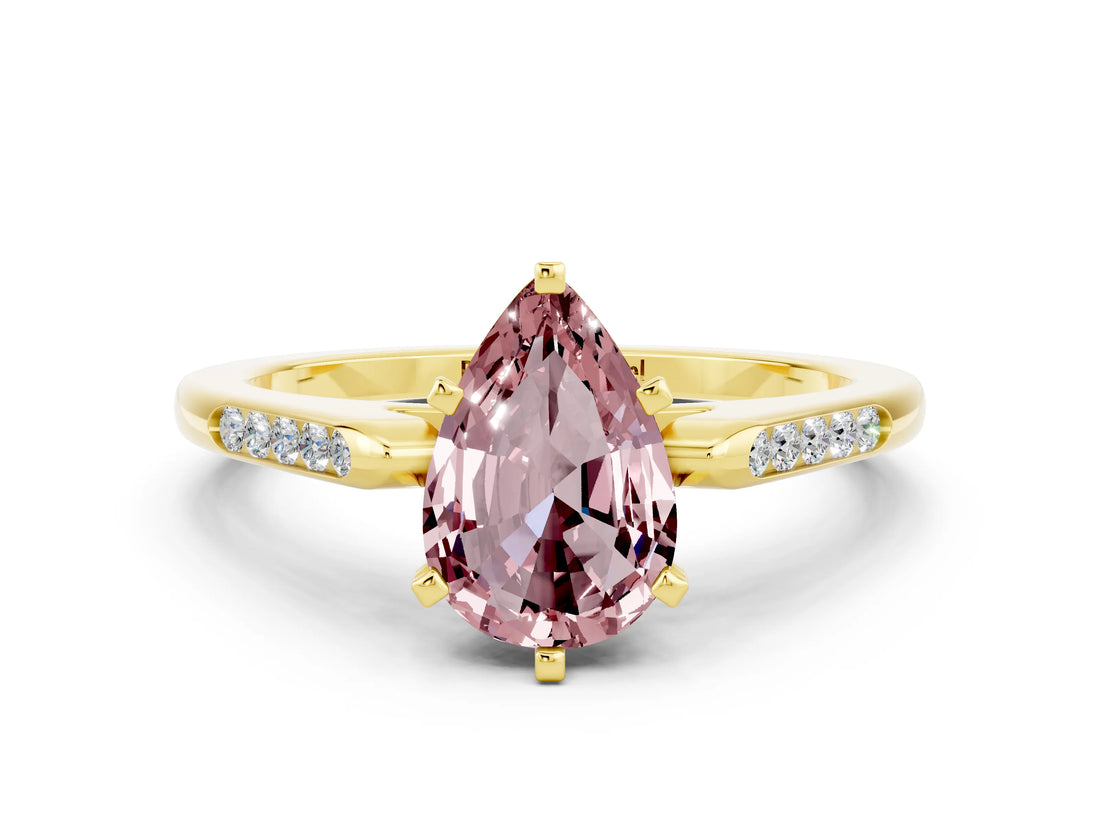 Yellow gold Pear Cut Cut Channel Set Solitaire Engagement Ring with Four-Prong Setting