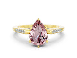 Yellow gold Pear Cut Cut Channel Set Solitaire Engagement Ring with Four-Prong Setting