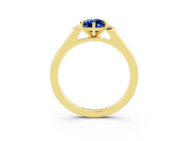 Yellow gold Pear Cut Blue Sapphire Solitaire Ring with Channel Set Round Band and Prong Setting