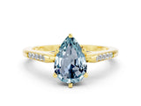 Yellow gold Pear Cut Cut Channel Set Solitaire Engagement Ring with Four-Prong Setting