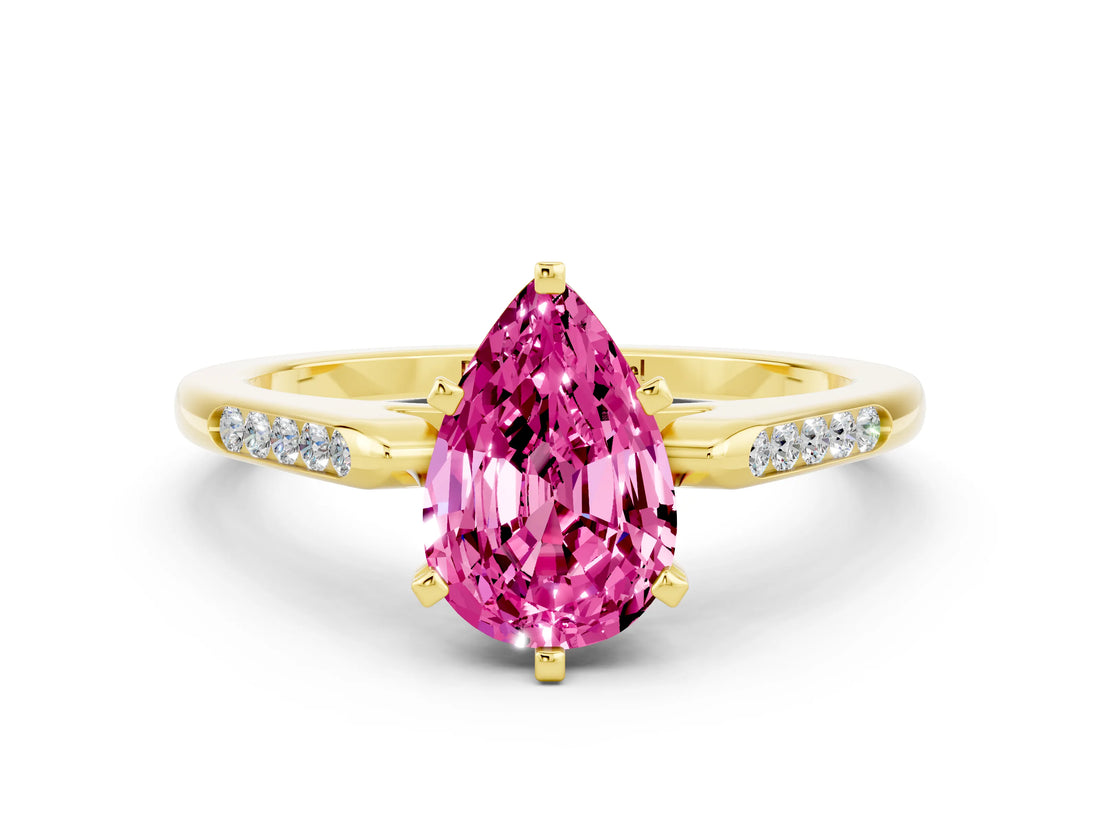 Yellow gold Pear Cut Cut Channel Set Solitaire Engagement Ring with Four-Prong Setting