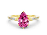 Yellow gold Pear Cut Cut Channel Set Solitaire Engagement Ring with Four-Prong Setting