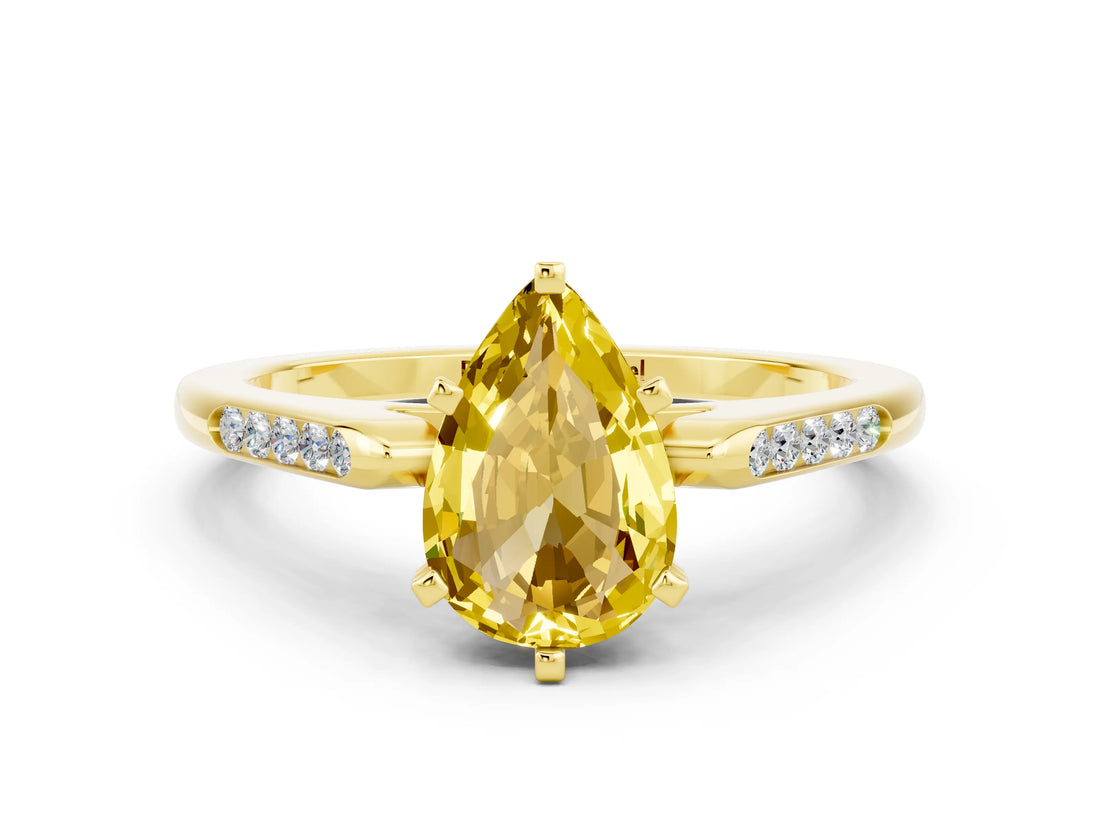 Yellow gold Pear Cut Cut Channel Set Solitaire Engagement Ring with Four-Prong Setting