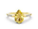 Yellow gold Pear Cut Cut Channel Set Solitaire Engagement Ring with Four-Prong Setting