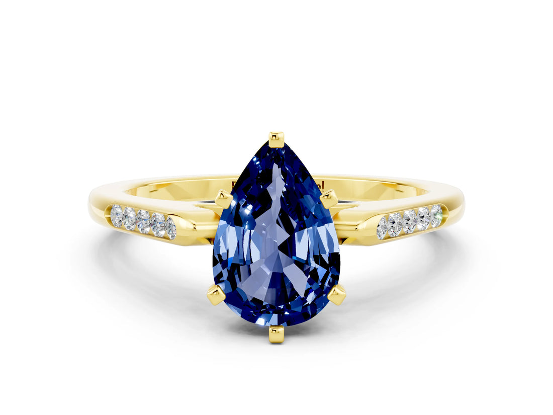 Yellow gold Pear Cut Cut Channel Set Solitaire Engagement Ring with Four-Prong Setting