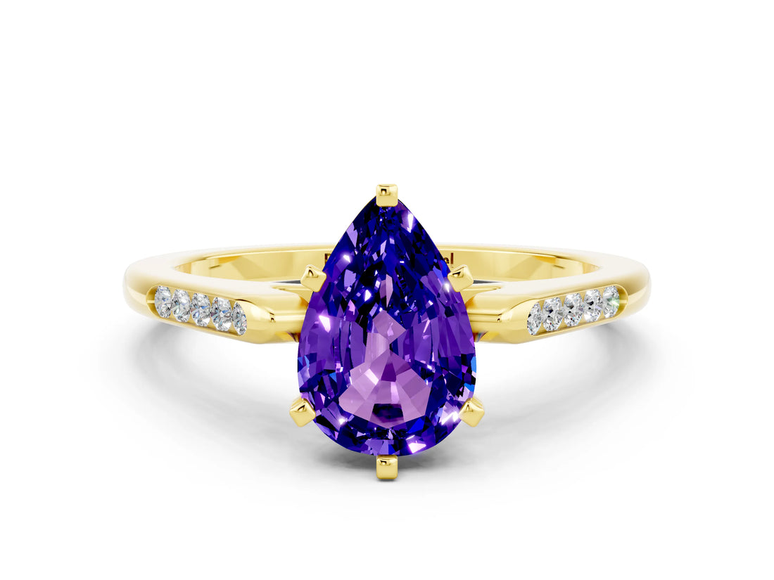 Yellow gold Pear Cut Cut Channel Set Solitaire Engagement Ring with Four-Prong Setting