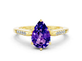 Yellow gold Pear Cut Cut Channel Set Solitaire Engagement Ring with Four-Prong Setting