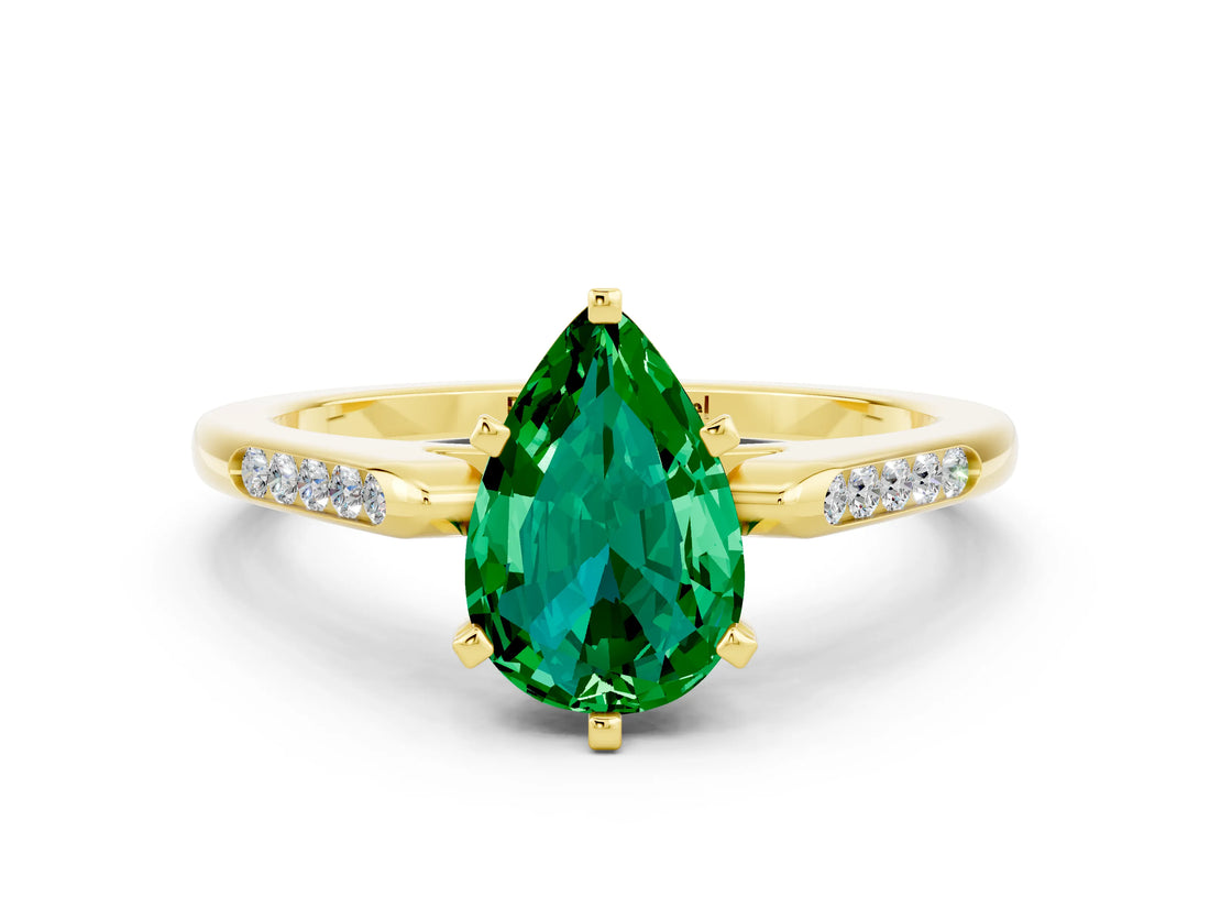Yellow gold Pear Cut Cut Channel Set Solitaire Engagement Ring with Four-Prong Setting