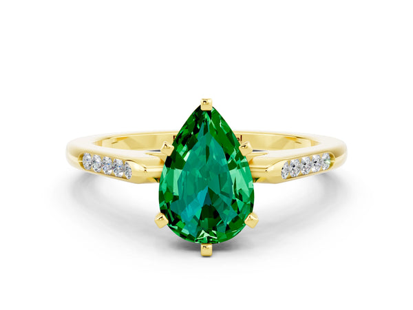 Yellow gold Pear Cut Emerald Solitaire Ring with Channel Set Round Band and Prong Setting