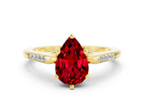 Yellow gold Pear Cut Cut Channel Set Solitaire Engagement Ring with Four-Prong Setting