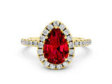 Yellow gold Pear Cut Cut Diamond Floral Halo Engagement Ring with Pavé Band and Prong Setting