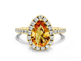 Yellow gold Pear Cut Cut Diamond Floral Halo Engagement Ring with Pavé Band and Prong Setting