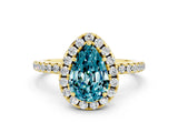 Yellow gold Pear Cut Cut Diamond Floral Halo Engagement Ring with Pavé Band and Prong Setting