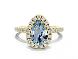 Yellow gold Pear Cut Cut Diamond Floral Halo Engagement Ring with Pavé Band and Prong Setting