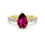 Yellow gold Pear Cut Cut Diamond Pavé Band with Four-Prong Setting