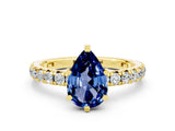 Yellow gold Pear Cut Cut Diamond Pavé Band with Four-Prong Setting