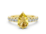 Yellow gold Pear Cut Cut Diamond Pavé Band with Four-Prong Setting