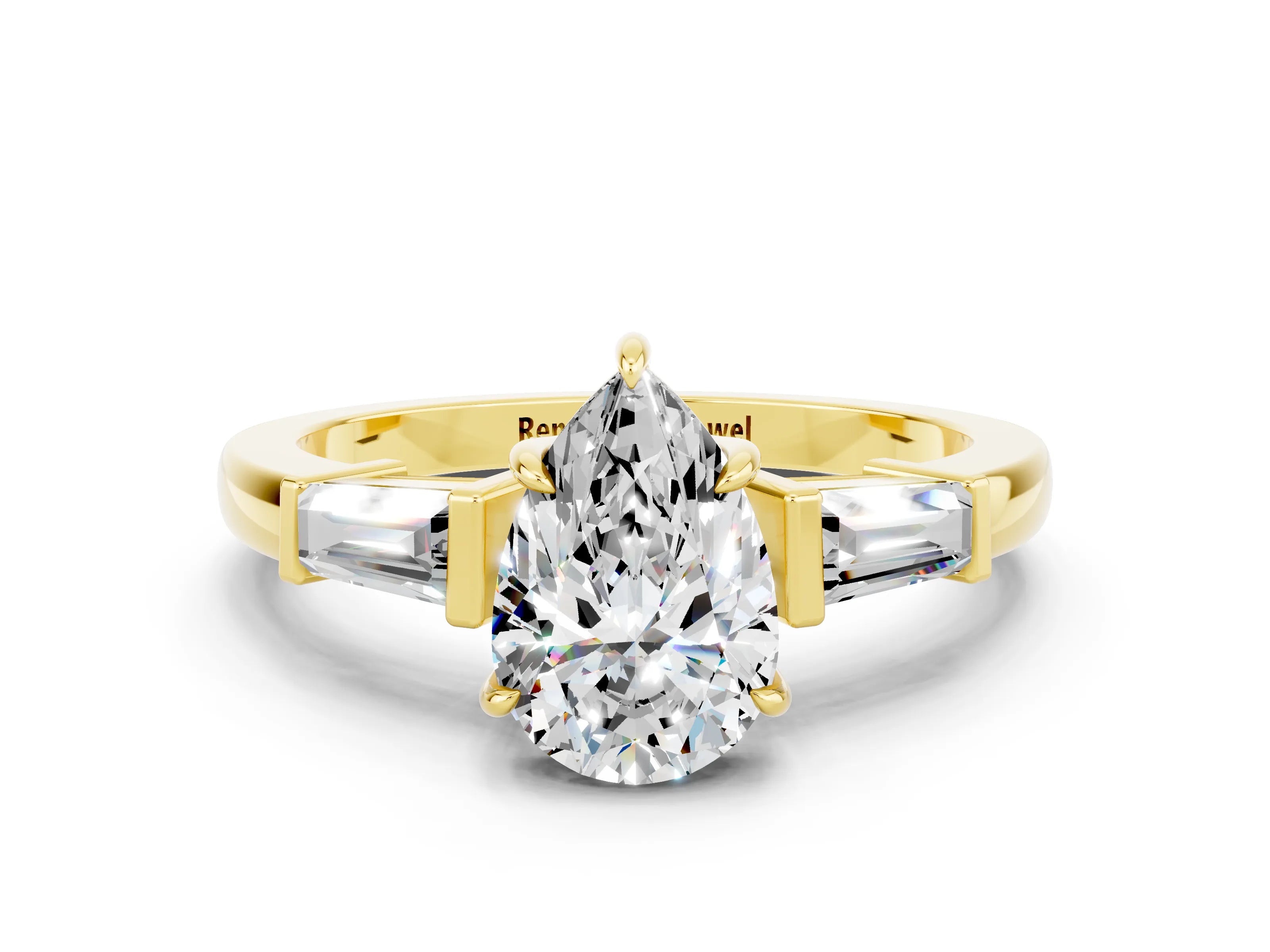 Yellow gold Pear Cut Cut Diamond Ring with Tapered Baguette Side Stones in Four-Prong Setting