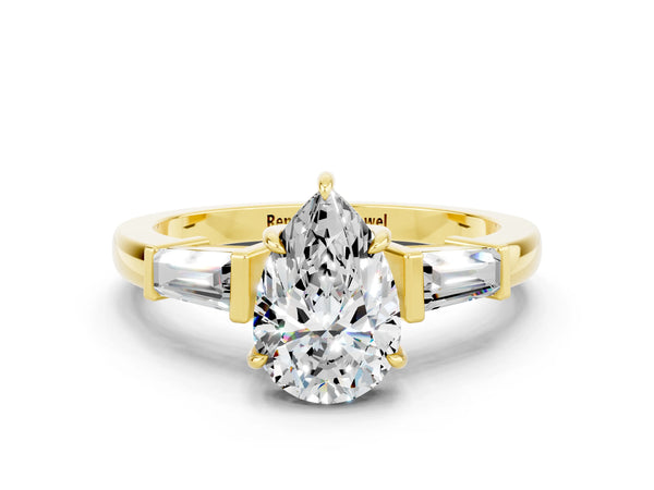 Yellow gold Pear Cut Moissanite Three-Stone Ring with Tapered Baguette Side Stones and Prong Setting
